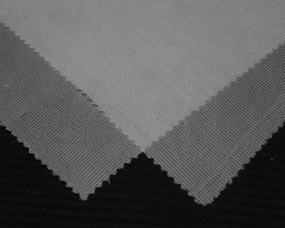 dresses and lightweight jacket interlining sample on black background