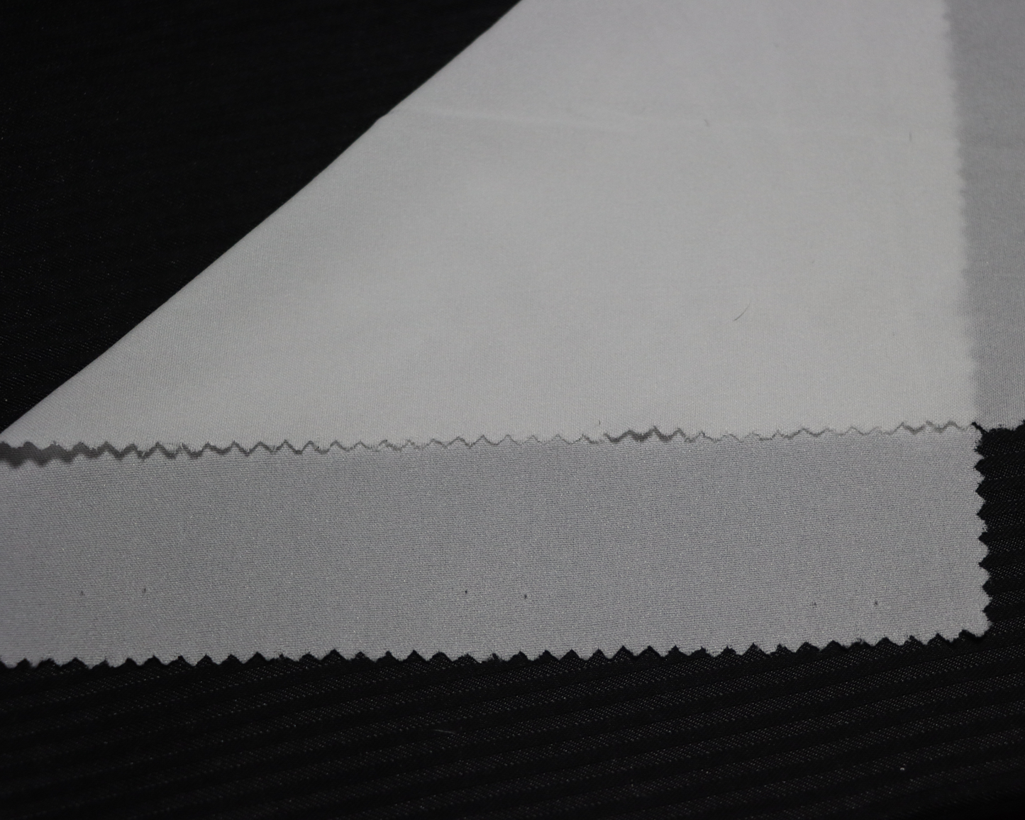 White colour, low GSM fusible dress interlining sample