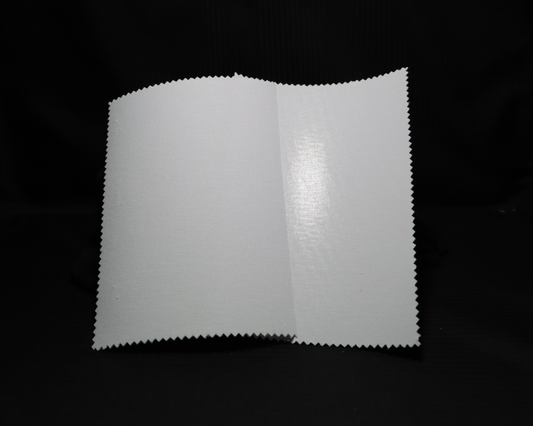 two fusible white colour interlining samples on a black background
