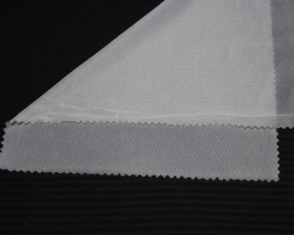 sample of 4-way stretch interlining on black background