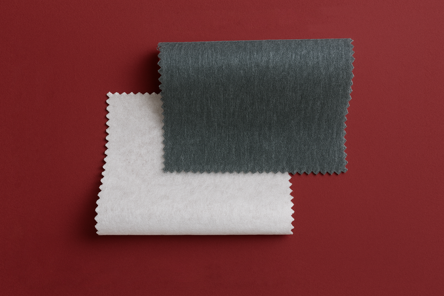 non woven interlining swatches on a red background